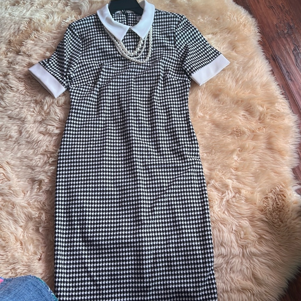 Spring dress with pearl necklace
